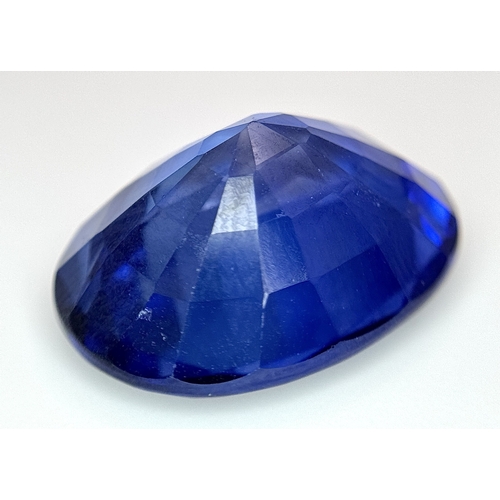 1115 - A W.G.I Certified Lab Grown 24.24ct Sapphire. Oval mixed cut.