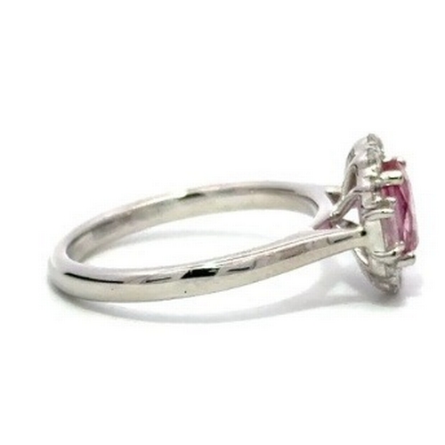 517 - A Platinum natural Pink Sapphire and Diamond Ring. Pink sapphire - 1.26ct. Diamond - 0.40ctw. Size L... 