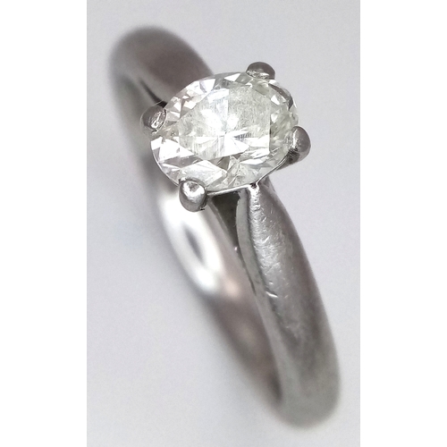 544 - A 950 Platinum, Diamond Solitaire Ring. 0.55ct oval cut diamond. SL2 clarity. Slight colour tint. Si... 