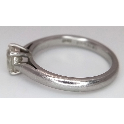 544 - A 950 Platinum, Diamond Solitaire Ring. 0.55ct oval cut diamond. SL2 clarity. Slight colour tint. Si... 