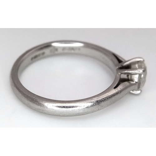 544 - A 950 Platinum, Diamond Solitaire Ring. 0.55ct oval cut diamond. SL2 clarity. Slight colour tint. Si... 