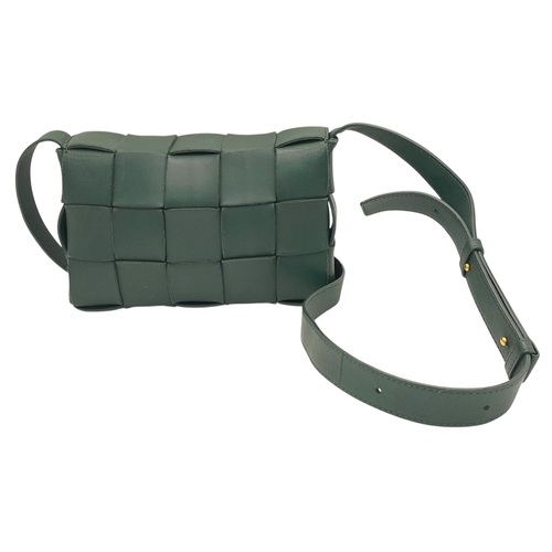 551 - A Bottega Veneta Green Intrecciato Leather Shoulder Bag. Green leather exterior with a gold-toned ha... 