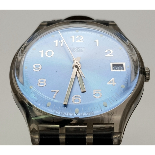 1001 - A SWATCH, BLUE CHOCO WATCH. 2003 MODEL GM415. UNWORN AND IN ORIGINAL PACKAGING. IN FULL WORKING ORDE... 