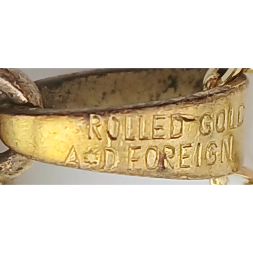 1007 - A Vintage Rolled Gold Heart Locket Pendant on a later 46cm Gold Gilded Sterling Silver Chain. The Lo... 