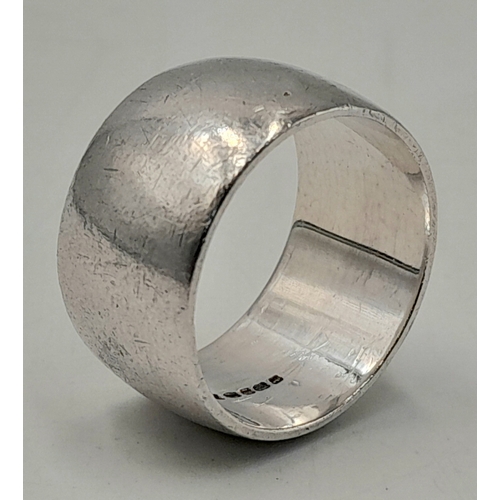 1015 - A STERLING SILVER, 12MM BAND RING. 9.9G, SIZE Q. A/S RED 2