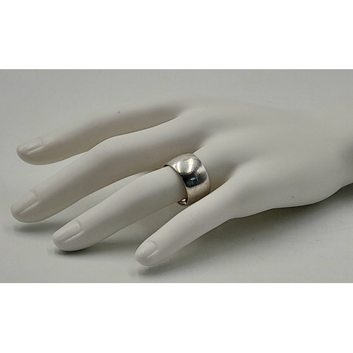 1015 - A STERLING SILVER, 12MM BAND RING. 9.9G, SIZE Q. A/S RED 2