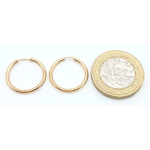 1036 - A PAIR OF, 9K YELLOW GOLD, HOOP, SLEEPER EARRINGS. 0.4G. A/S RED 16