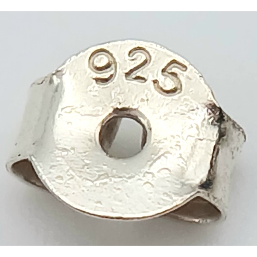 1057 - A PAIR OF STERLING SILVER, ENAMELLED, HALF HOOP EARRINGS. 5.1G. S/A 1585 - 3