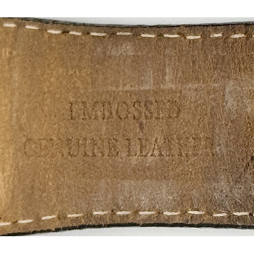 1064 - A DKNY, STONE SET, SQUARE FACE, BLACK LEATHER STRAP WATCH. WITH ORIGINAL STRAP AND BUCKLE. IN FULL W... 