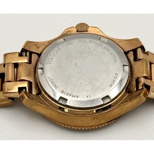 1085 - A FOSSIL, ROSE GOLD TONE, STONE SET, BRACELET WATCH. IN FULL WORKING ORDER. NEW BATTERY FITTED RECEN... 