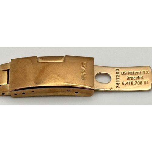 1085 - A FOSSIL, ROSE GOLD TONE, STONE SET, BRACELET WATCH. IN FULL WORKING ORDER. NEW BATTERY FITTED RECEN... 