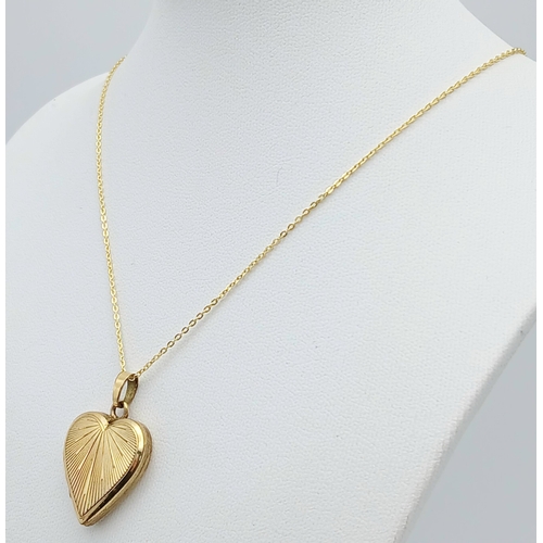 1105 - An Antique Rolled Gold Heart Locket Pendant on a later Gold Gilded Sterling Silver 46cm Length Chain... 