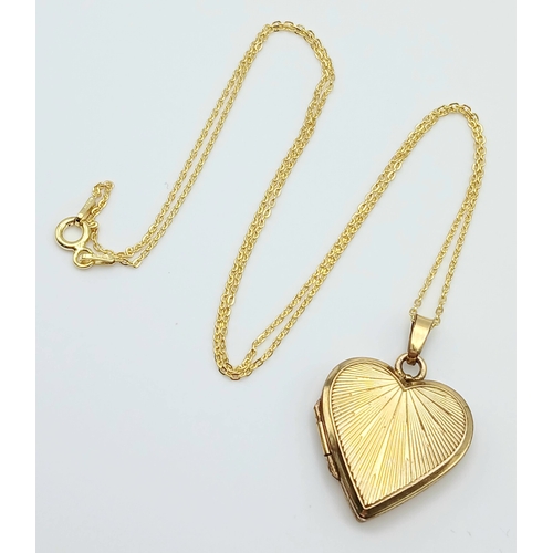 1105 - An Antique Rolled Gold Heart Locket Pendant on a later Gold Gilded Sterling Silver 46cm Length Chain... 