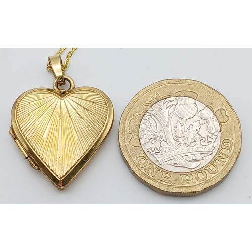 1105 - An Antique Rolled Gold Heart Locket Pendant on a later Gold Gilded Sterling Silver 46cm Length Chain... 