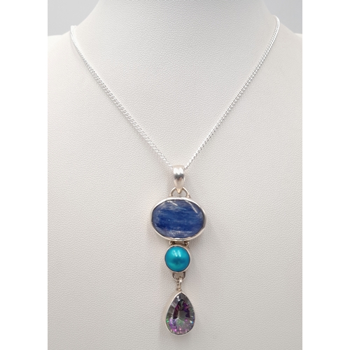 1084 - A Vintage Sterling Silver Kyanite and Mystic Topaz Pendant on a later 46cm Length Sterling Silver Ch... 