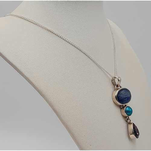 1084 - A Vintage Sterling Silver Kyanite and Mystic Topaz Pendant on a later 46cm Length Sterling Silver Ch... 