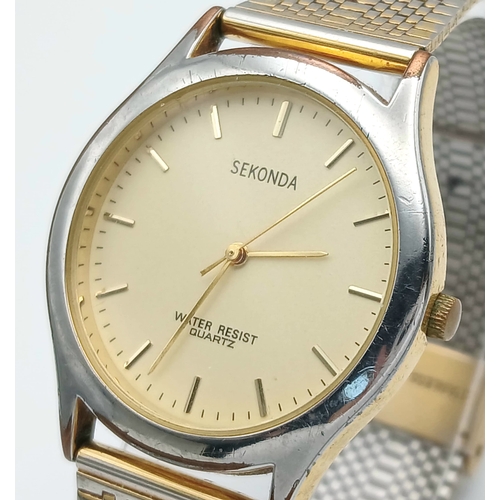 560 - Gentleman’s SEKONDA QUARTZ WRISTWATCH. Finished in Stainless Steel with quality Mesh Bracelet Strap.... 