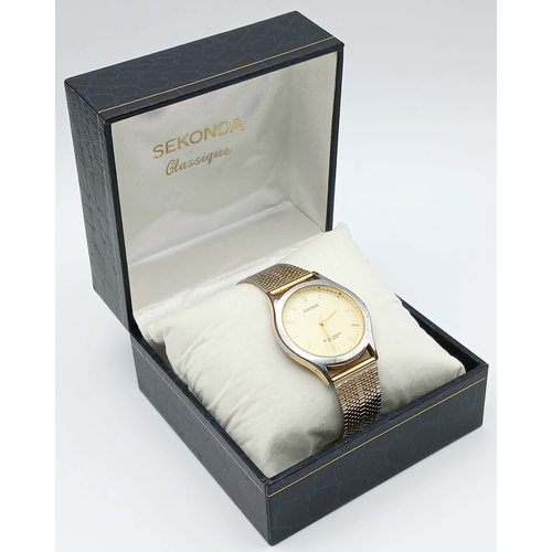 560 - Gentleman’s SEKONDA QUARTZ WRISTWATCH. Finished in Stainless Steel with quality Mesh Bracelet Strap.... 
