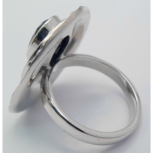 1014 - An Unique Sterling Silver Black Onyx and Modernist Design Ring Size N1/2. Measures 2.5cm Length at t... 