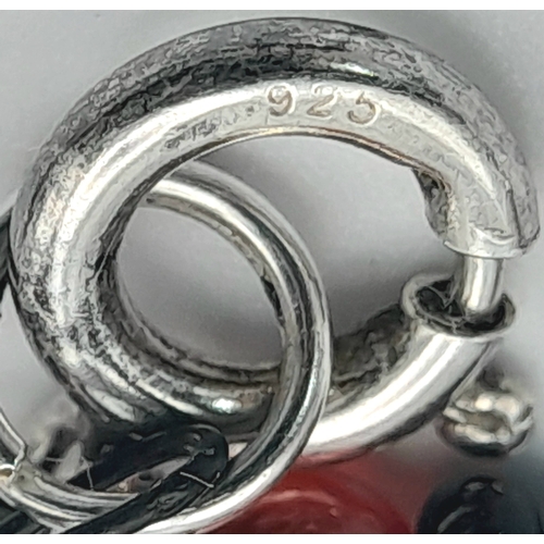 1100 - A red agate and hematite necklace with 925 silver clasp.
Approx 50cm length. Please see photos for d... 