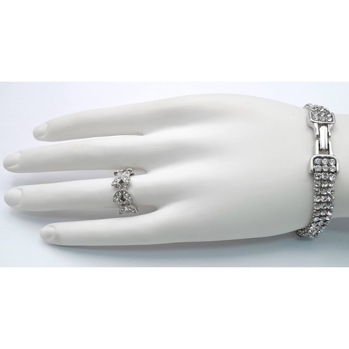 1120 - A SWAROVSKI, SILVER TONE, CRYSTAL SET BUTTERFLY RING. IN SIZE 52 / K/L. WITH A SWAROVSKI, SILVER TON... 