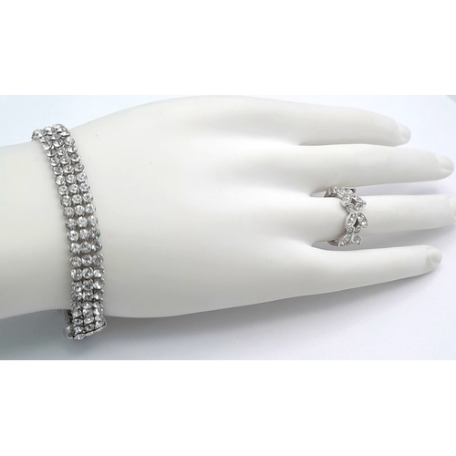 1120 - A SWAROVSKI, SILVER TONE, CRYSTAL SET BUTTERFLY RING. IN SIZE 52 / K/L. WITH A SWAROVSKI, SILVER TON... 