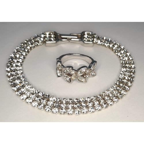 1120 - A SWAROVSKI, SILVER TONE, CRYSTAL SET BUTTERFLY RING. IN SIZE 52 / K/L. WITH A SWAROVSKI, SILVER TON... 