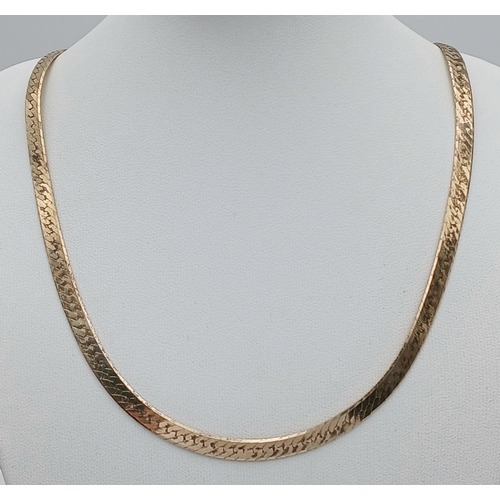 1079 - A 925 Italy silver necklace.
Comprising a flat herringbone style chain with textured finish and lobs... 