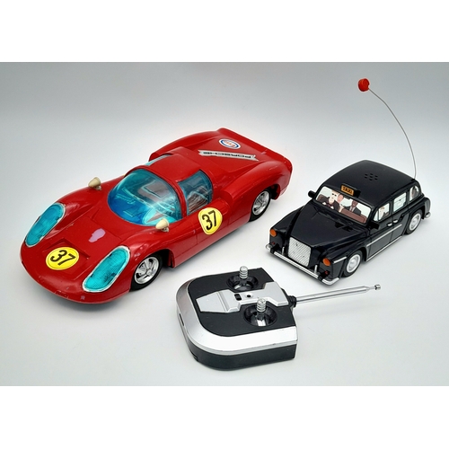 A 1960's Bandai remote control Porsche 910. No controller. With a ...
