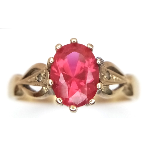 155 - A 9K Yellow Gold Garnet Solitaire Ring. Oval cut. Size P. 2.65g