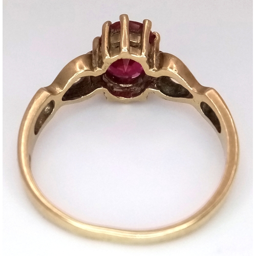 155 - A 9K Yellow Gold Garnet Solitaire Ring. Oval cut. Size P. 2.65g