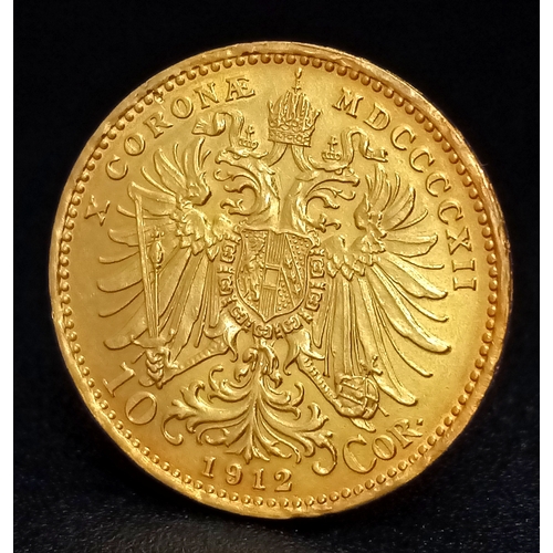 174 - A 1912 Austrian 10 Corona Gold Coin. 900 gold (21.6K) purity. 3.39g.