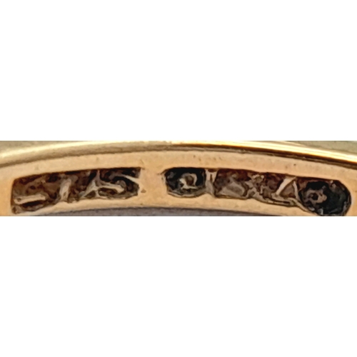 365 - A 9K Yellow Gold Opal Solitaire Ring. Cabochon stone with good colour play. Size J 1/2. 1.4g.