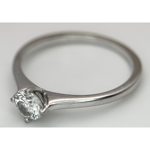 384 - An 18K White Gold Diamond Solitaire Ring. 0.31ct round brilliant cut diamond with E colour and VS1 c... 