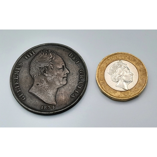 389 - An 1834 William IV One Penny Copper Coin. VF but please see photos.