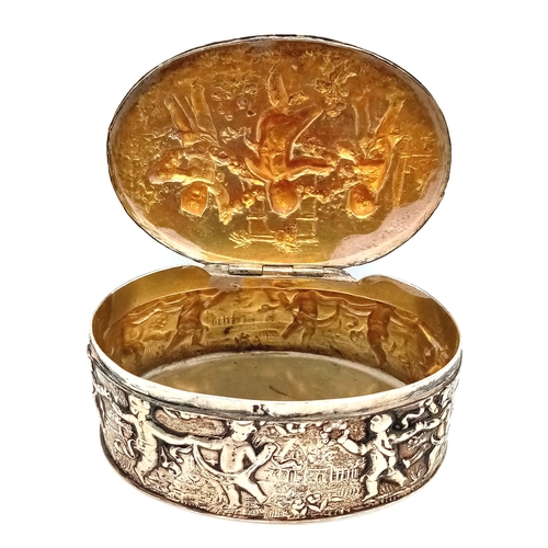 396 - An Antique Silver (800 Purity) German/Dutch Trinket Box. Repoussé decorative work of children playin... 
