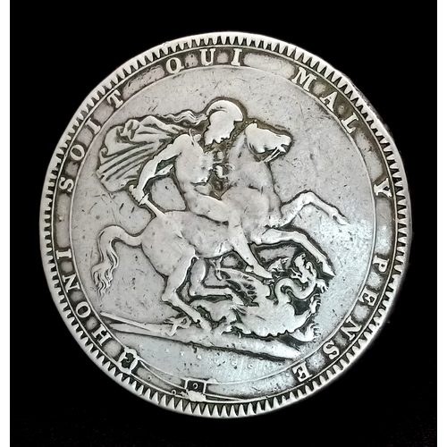 122 - An 1818 George III Silver Crown Coin. LIX. VF+ but please refer to photos.