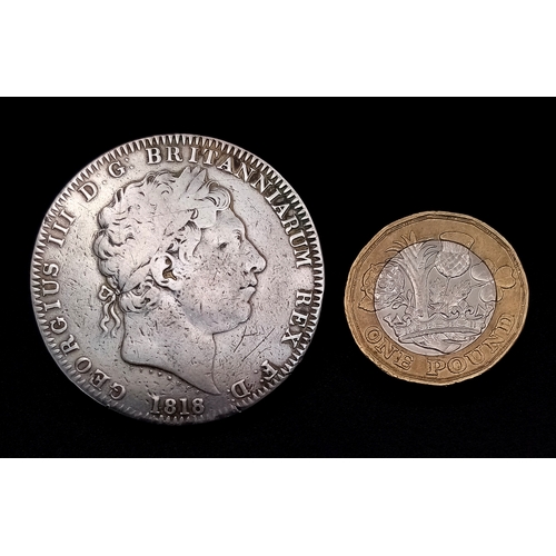 122 - An 1818 George III Silver Crown Coin. LIX. VF+ but please refer to photos.