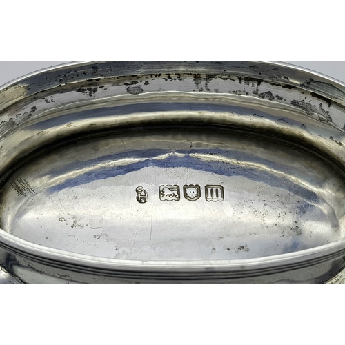 136 - An Antique Sterling Silver Serving Basket with Swing Handle.
Hallmarks for London 1907. 19cm length ... 