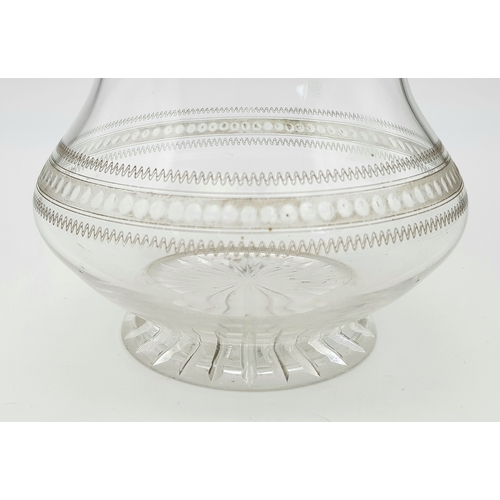 141 - An Antique Victorian Cut Glass Claret Jug with Sterling Silver Scrolled Handle, Lid with ornate fini... 