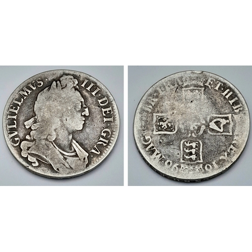 145 - A 1696 William III Silver Crown Coin. First bust, round collar. Obverse VF, Reverse F grade but plea... 