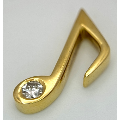 153 - An 18K Yellow Gold (tests as) and Diamond Set Musical Note Pendant. 2cm. 3.65g.