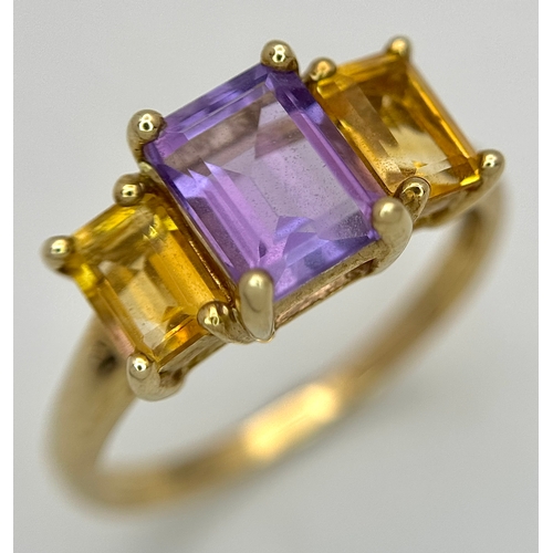 162 - A 9K Yellow Gold Citrine and Amethyst Ring. Emerald cuts. Size Q. 2.7g.