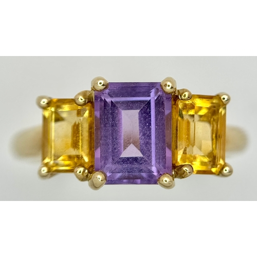 162 - A 9K Yellow Gold Citrine and Amethyst Ring. Emerald cuts. Size Q. 2.7g.