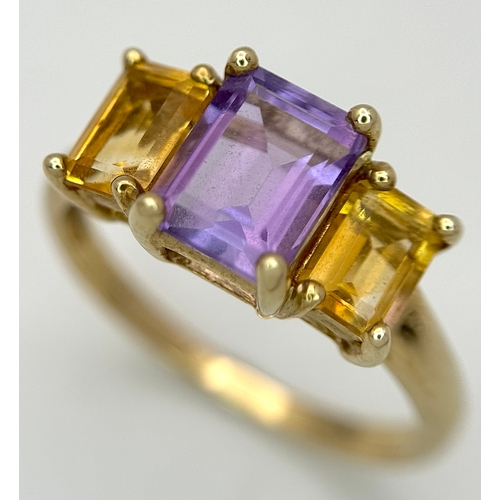 162 - A 9K Yellow Gold Citrine and Amethyst Ring. Emerald cuts. Size Q. 2.7g.