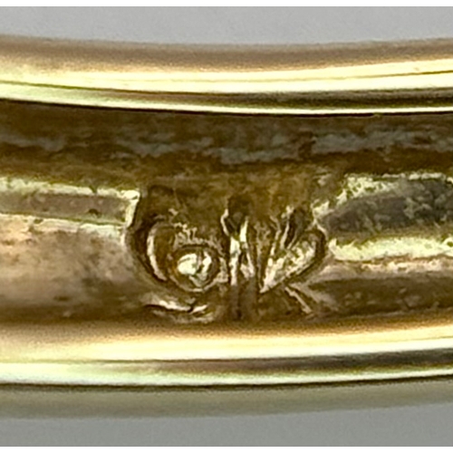 162 - A 9K Yellow Gold Citrine and Amethyst Ring. Emerald cuts. Size Q. 2.7g.