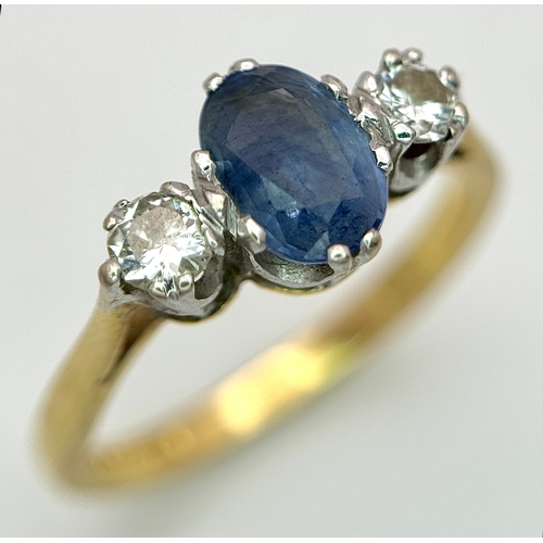 176 - A Gorgeous 18K Yellow Gold Sapphire and Diamond Ring. Oval cut pale blue 0.65ct sapphire with a 0.15... 