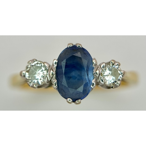 176 - A Gorgeous 18K Yellow Gold Sapphire and Diamond Ring. Oval cut pale blue 0.65ct sapphire with a 0.15... 