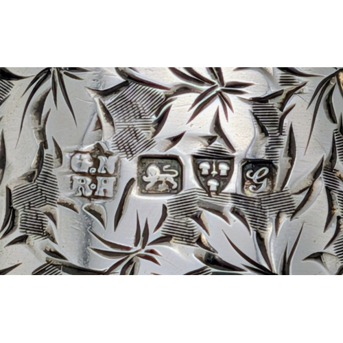 401 - An Antique Sterling Silver Napkin Ring with Leaf Engravings. Hallmarked Chester 1907. Weight 27.50g.... 