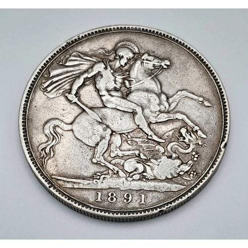 408 - An 1891 Queen Victoria Silver Crown Coin. Good definition.